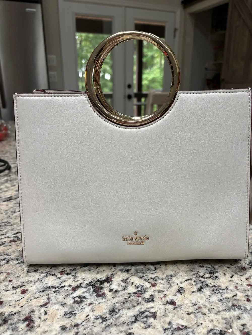 kate spade white leather bag with gold circular handle
